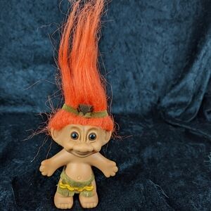 Russ native American dressed Troll orange hair